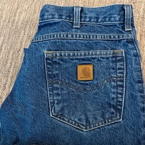 Carhartt Men’s Dark Blue Denim Relaxed Fit Jeans with Brown Patch